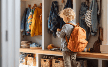 child with backpack